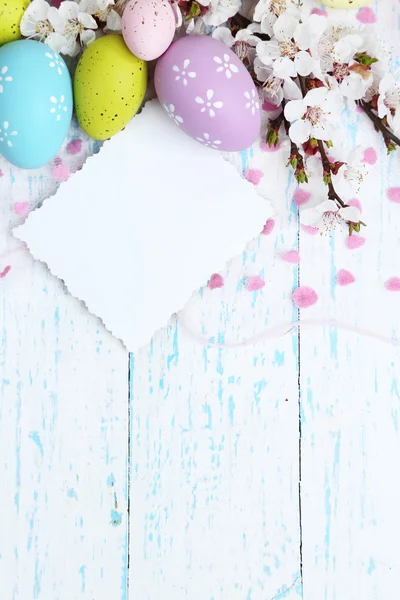 Easter composition with flowering branches on wooden table close-up — Stock Photo, Image