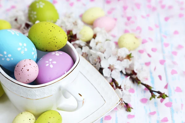 Easter composition with flowering branches on wooden table close-up — Stock Photo, Image