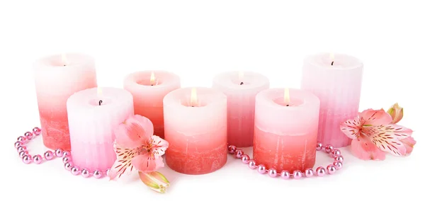 Beautiful candles with flowers isolated on white — Stock Photo, Image