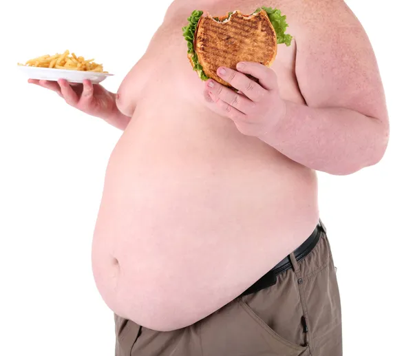 Fat man holding sandwich and fried potato, isolated on white Stock Photo