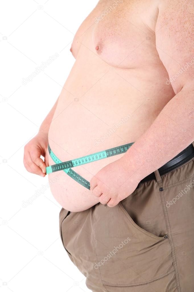 Fat man holding measuring tape. Conceptual photo of weight loss. Isolated on white