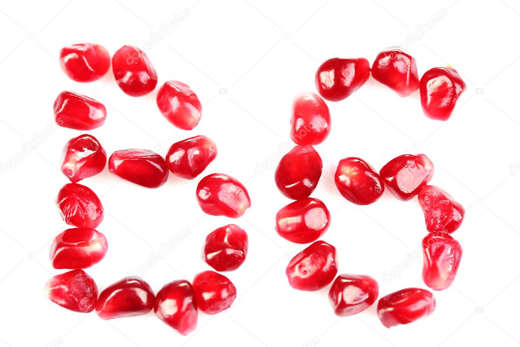 Vitamin B6 sign made of pomegranate seeds, isolated on white