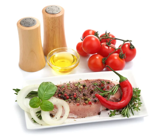 Raw meat steak with spices and herbs on plate, isolated on white — Stock Photo, Image