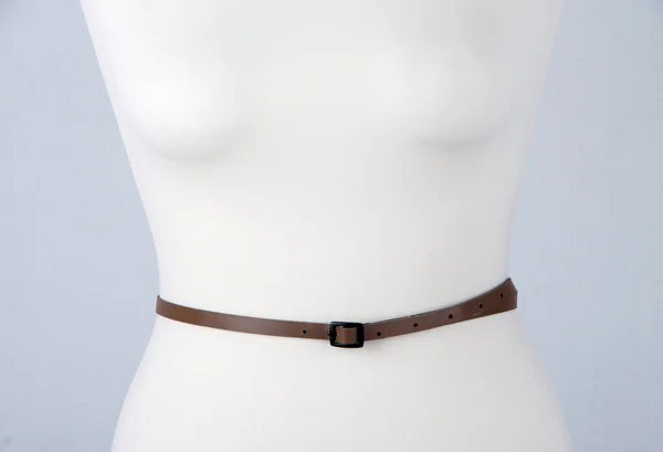 Strap on mannequin on grey background close-up — Stock Photo, Image