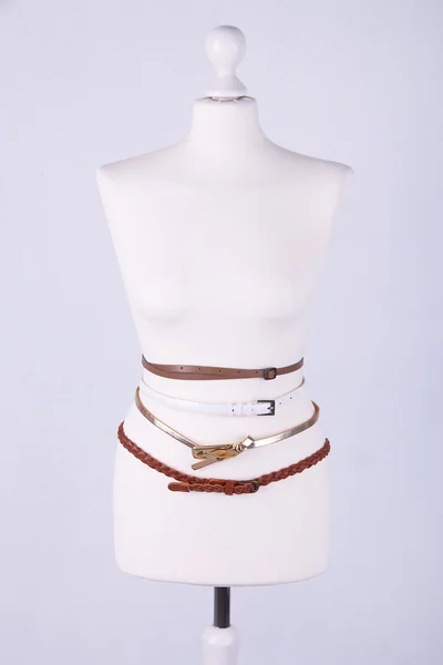 Straps on mannequin on grey background close-up — Stock Photo, Image