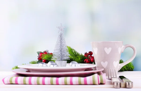 Set of utensil for Christmas dinner, on table, on light background — Stock Photo, Image