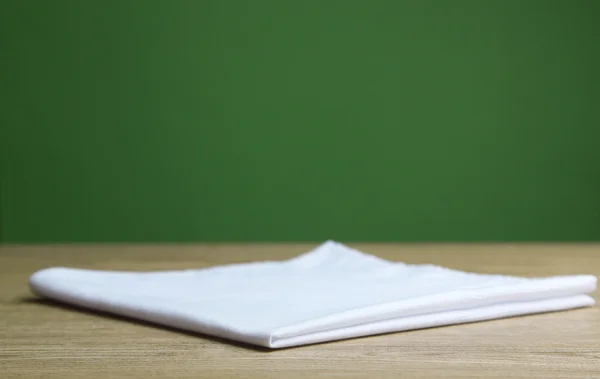 Bakgrund med träbord och duk — Stockfoto