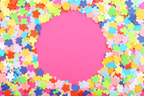 Confetti frame on pink background — Stock Photo, Image