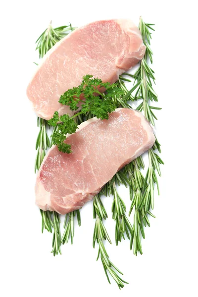 Raw meat steak with herbs isolated on white — Stock Photo, Image