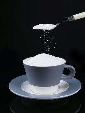 siyah üzerine izole Kupası şeker