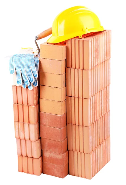 New bricks and building tools, isolated on white — Stock Photo, Image