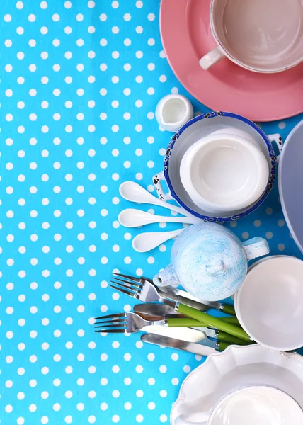 Different tableware on tablecloth — Stock Photo, Image