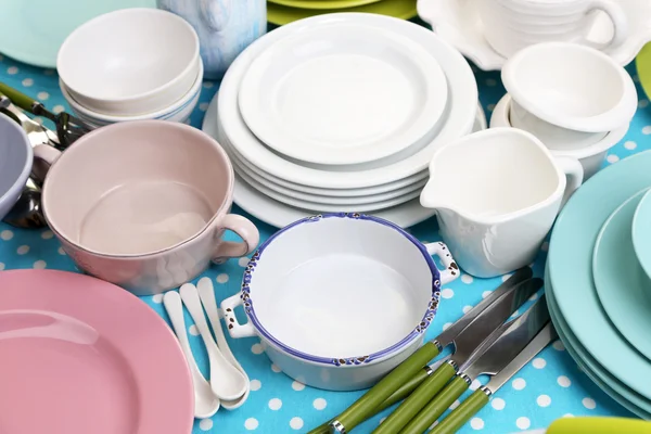 Different tableware on tablecloth — Stock Photo, Image