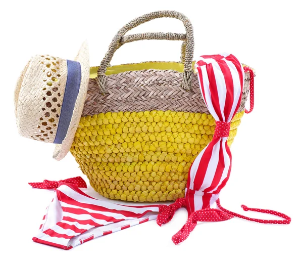 Wicker bag and swimsuit, isolated on white — Stock Photo, Image