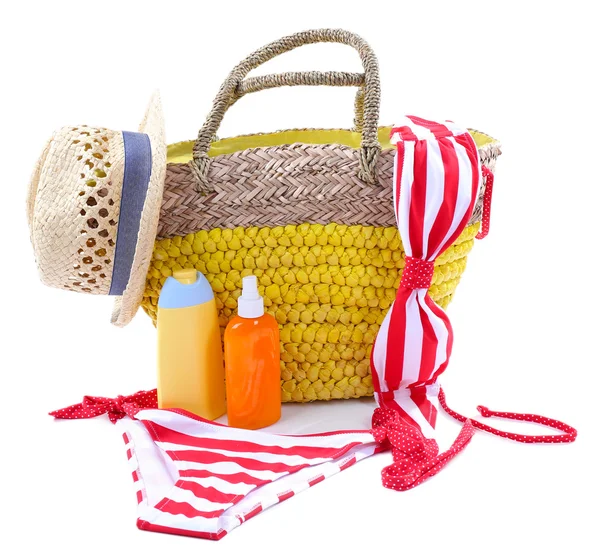 Wicker bag and swimsuit, isolated on white — Stock Photo, Image