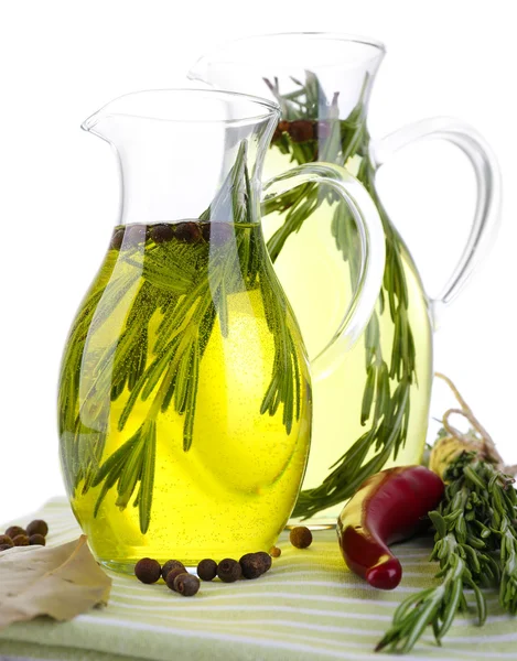 Essential Oil with rosemary in glass jugs, on cutting boards, isolated on white — Stock Photo, Image