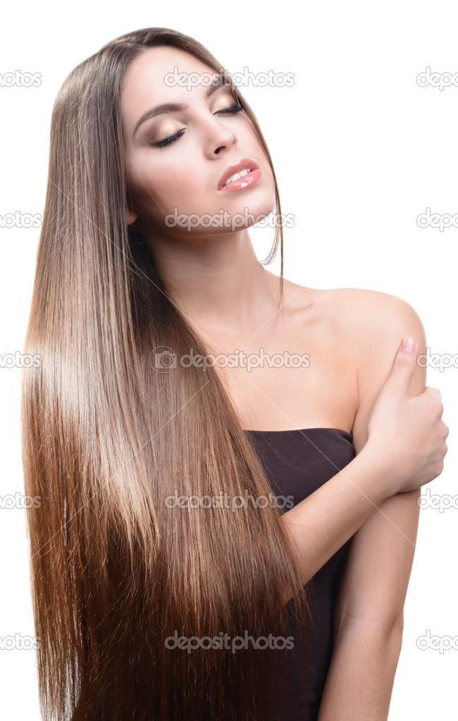 Beautiful young woman with long hair isolated on white