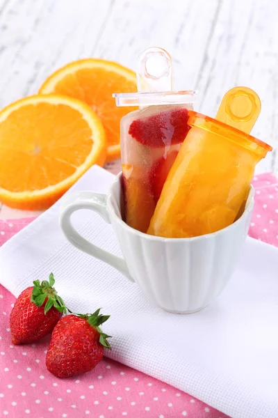 Fruit ice cream in cup on wooden table close-up — Stock Photo, Image