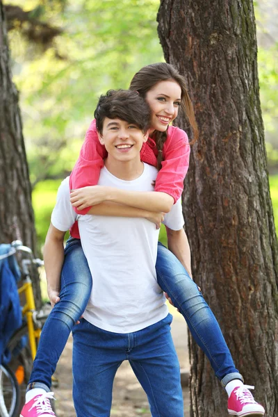 Beautiful young couple in park — Stock Photo, Image