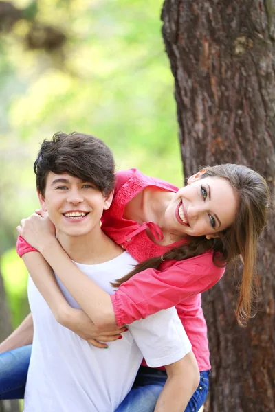 Beautiful young couple in park — Stock Photo, Image