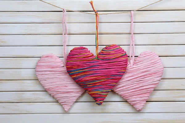 Decorative hearts on wooden background — Stock Photo, Image