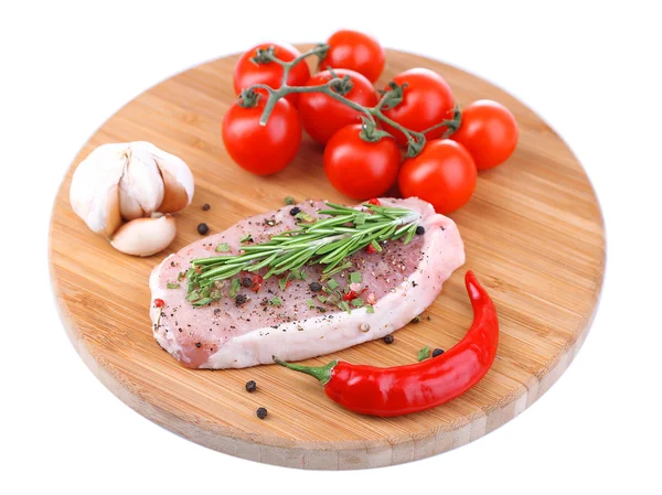 Raw meat steak with herbs and spices on cutting board, isolated on white — Stock Photo, Image