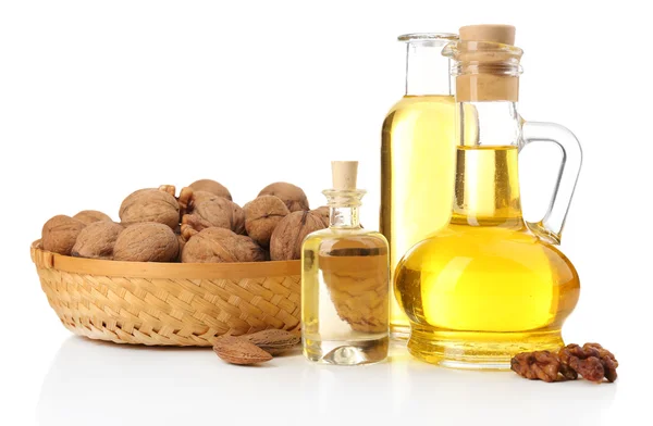 Walnut oil and nuts, isolated on white — Stock Photo, Image