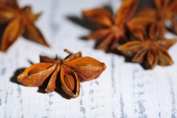 Star anise on wooden background — Stock Photo, Image