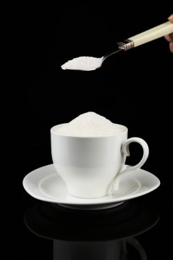 siyah üzerine izole Kupası şeker