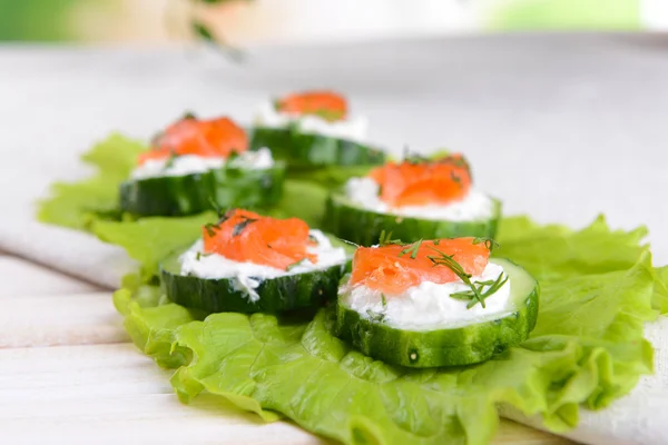 Delicious canapes on table close-up — Stock Photo, Image