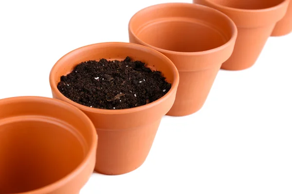 Clay flower pots and soil, isolated on white — Stock Photo, Image