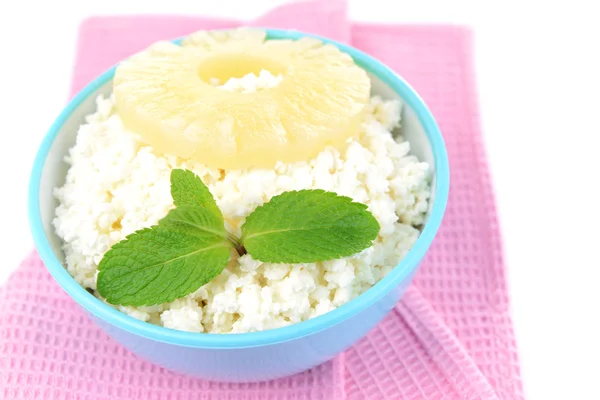 Bowl of tasty cottage cheese with pineapple, isolated on white — Stock Photo, Image