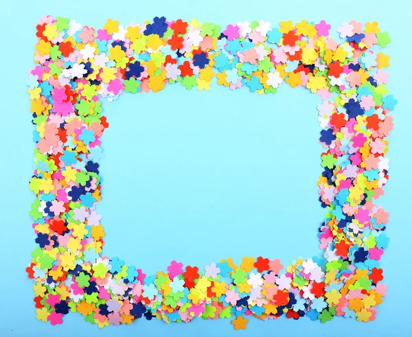 Cornice Confetti su sfondo blu — Foto Stock