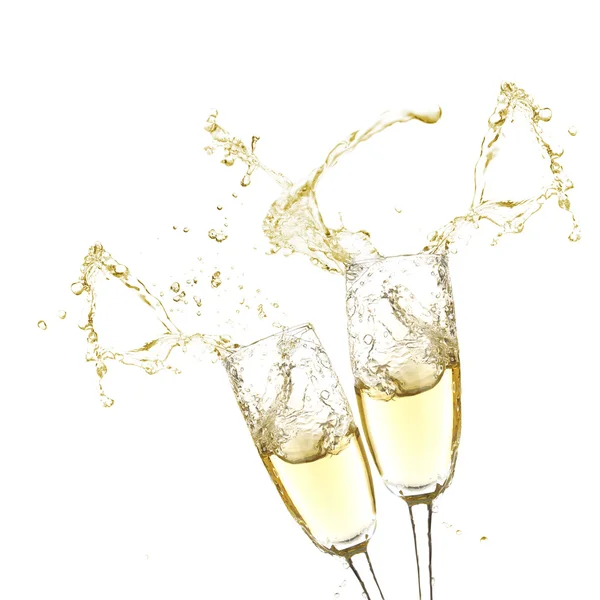 Gläser Champagner mit Spritzer, isoliert auf weiß — Stockfoto