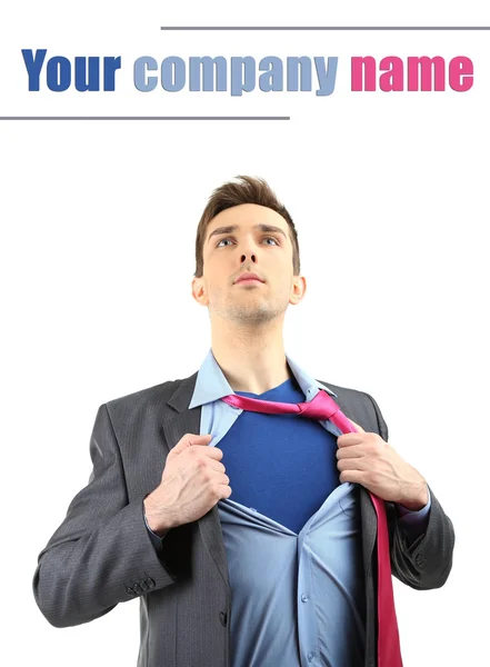 Young business man tearing apart his shirt revealing  superhero suit, isolated on white — Stock Photo, Image