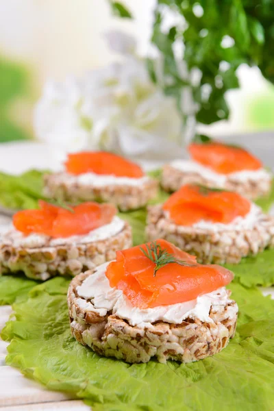 Delicious canapes on table close-up — Stock Photo, Image