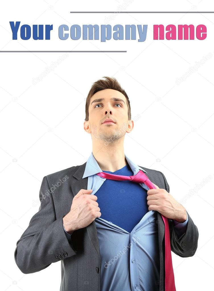 Young business man tearing apart his shirt revealing  superhero suit, isolated on white