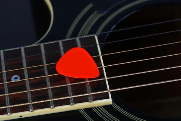 Colourful plectrum on guitar, close up — Stock Photo, Image