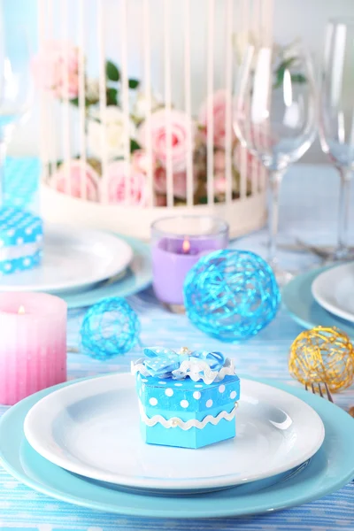 Table serving with colorful tableware on room background — Stock Photo, Image