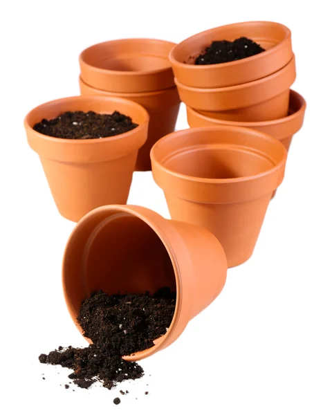 Pots et terre de fleurs d'argile, isolés sur blanc — Photo