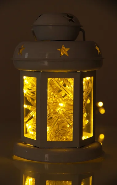 Decorative glowing lantern at night