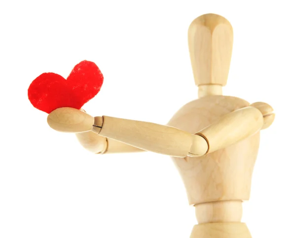 Maniquí de madera que sostiene el corazón rojo aislado en blanco — Foto de Stock