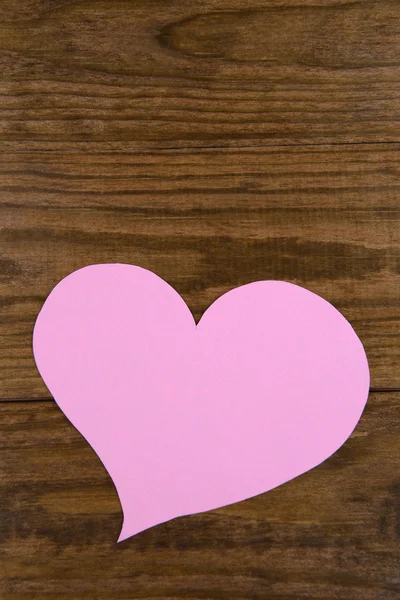 Papierowe serca na drewnianym tle — Zdjęcie stockowe
