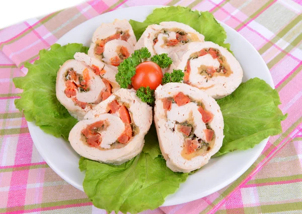 Delicious chicken roll on plate on table close-up — Stock Photo, Image