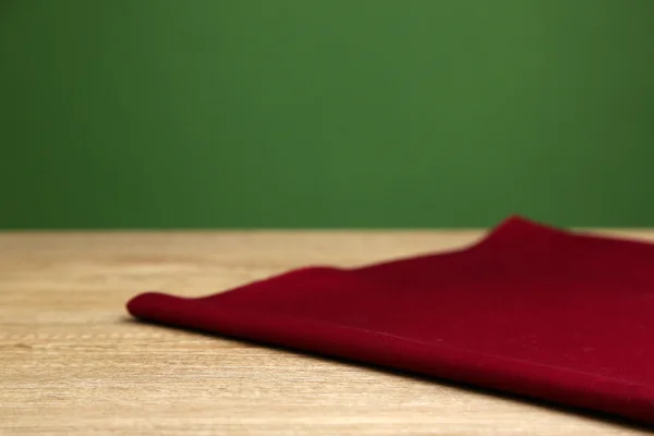 Arrière-plan avec table et nappe en bois — Photo