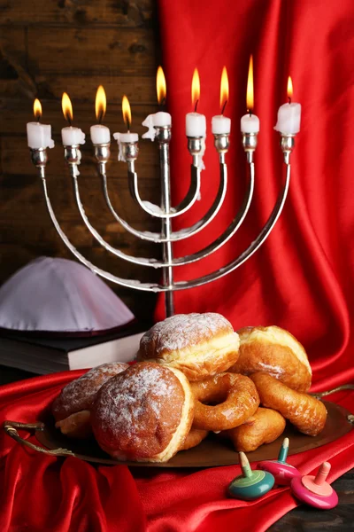 Feestelijke compositie voor hanukkah op doek close-up — Stockfoto