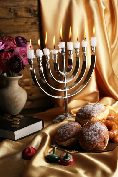 Composición festiva para Hanukkah en primer plano de tela —  Fotos de Stock