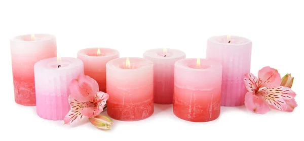 Beautiful candles with flowers isolated on white — Stock Photo, Image