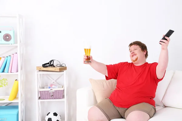 Líný obézní muž — Stock fotografie
