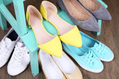 Shoe shelf with women shoes close up clipart